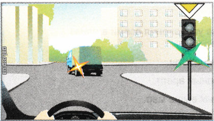 Разрешается ли вам объехать грузовой автомобиль с правой стороны на изображенном перекрестке?