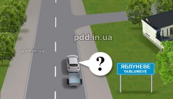 З якою максимальною швидкістю дозволено рух легкових автомобілів із причепами на дорогах, що проходять через населені пункти, позначені таким дорожнім